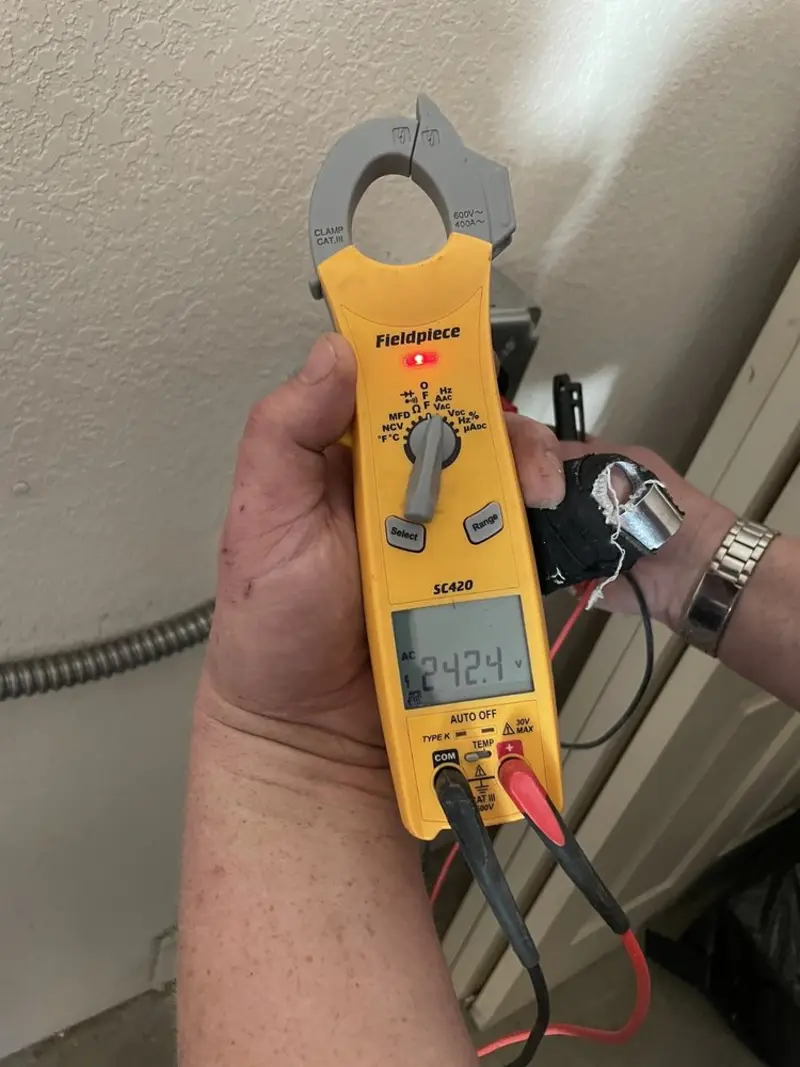 Voltage testing with clamp meter during Aluminum Wiring Replacement in Norwalk